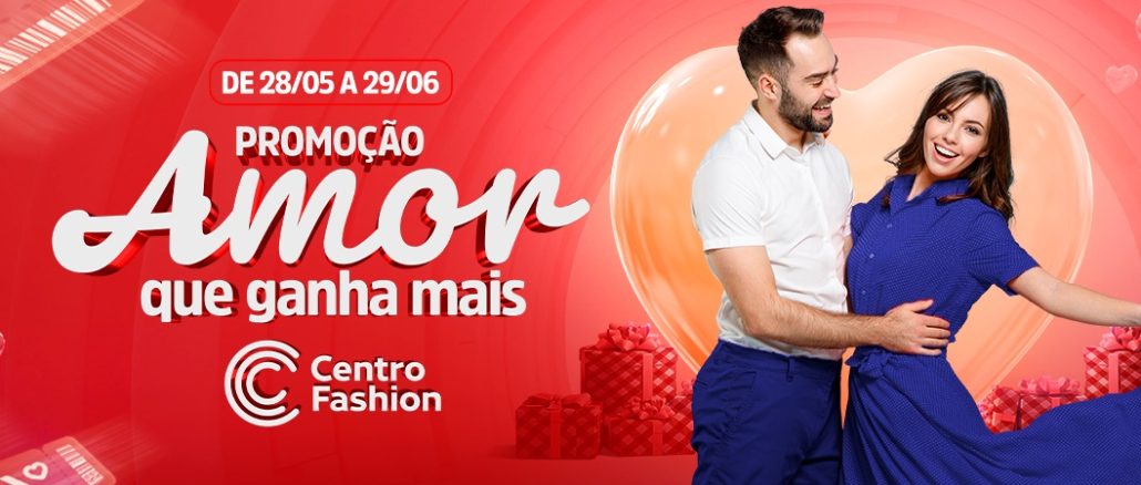 Banner promocional do Centro Fashion para o Dia dos Namorados, com um grande coração vermelho e o texto "Promoção Amor que ganha mais. A cada R$ 150 em compras = 1 cupom e concorra a R$ 30 mil em vales-compras." A promoção é válida de 28 de maio a 29 de junho.