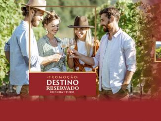 Anúncio promocional da Concha y Toro com uma garrafa de vinho em destaque. O texto oferece 5 viagens para o Chile com acompanhante e 5 adegas climatizadas por semana, na compra de vinhos da linha Reservado. As chances dobram na compra da linha Sweet.