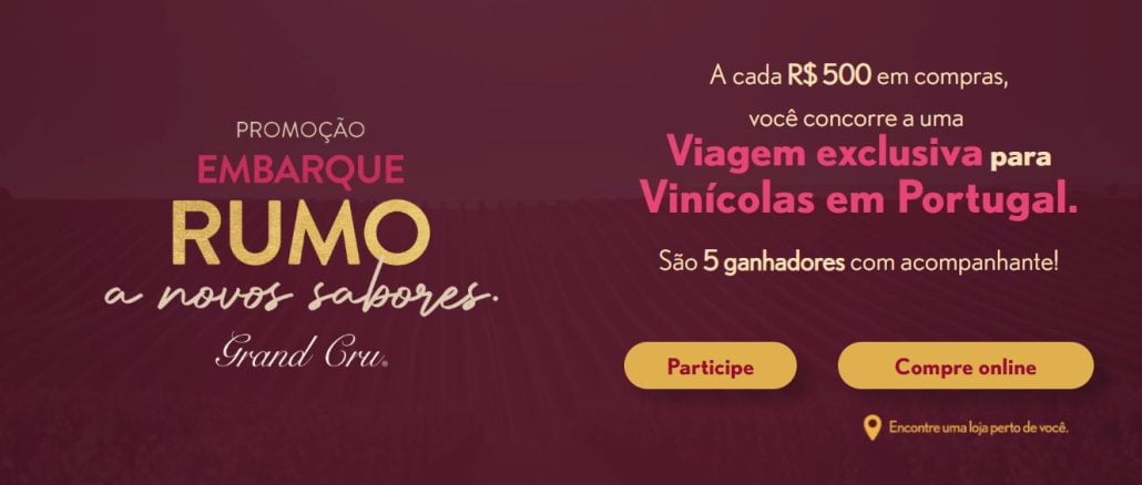 Promoção Embarque Rumo a Novos Sabores Grand Cru Anúncio da Grand Cru com a imagem de um vinhedo e o texto "Embarque rumo a novos sabores. São 5 ganhadores com acompanhante! Compre R$500 em produtos e concorra a uma viagem exclusiva para Portugal."