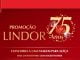 Imagem promocional da Lindt celebrando os 75 anos do chocolate LINDOR. A imagem tem fundo vermelho e texto em branco e dourado, com o logotipo da Lindt no canto superior esquerdo e um bombom LINDOR no centro. A promoção oferece a chance de ganhar uma viagem para a Suíça e um encontro com Roger Federer.