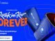 Uma imagem promocional azul do Itaú Uniclass para o Rock in Rio. O texto "PROMOÇÃO Rock in Rio Forever" está em destaque, seguido por "Confirme sua presença pra sempre!" e um botão "Cadastre-se agora".