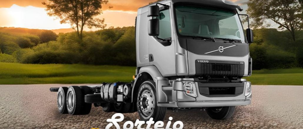 Sorteio Caminhão do Paulo Landim Caminhão Volvo VM prateado estacionado em estrada de terra com o pôr do sol ao fundo. Texto em destaque na frente do caminhão: "Sorteio Caminhão do Paulo Landim".