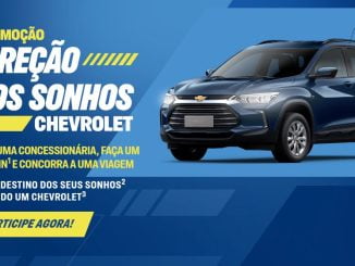 A imagem promocional da Chevrolet destaca a "Promoção Direção dos Sonhos". À esquerda, o texto em letras grandes e chamativas diz: "Promoção Direção dos Sonhos Chevrolet". Abaixo, há instruções para participar: "Visite uma concessionária, faça um check-in e concorra a uma viagem para o destino dos seus sonhos dirigindo um Chevrolet". À direita, um carro Chevrolet azul escuro está em destaque. Na parte inferior, um botão amarelo diz "Participe agora!".