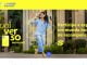 Banner promocional do Universo Ourocard do Banco do Brasil. Uma mulher sorridente, vestida de azul claro, usa fones de ouvido e segura um celular enquanto celebra. Ao fundo, um ambiente urbano com vegetação. O texto destaca: "Participe e explore um mundo incrível de recompensas!" com ícones de presente e moedas.