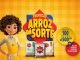 Uma garota sorridente de avental amarelo segura uma colher de pau ao lado de embalagens de arroz Pilecco Nobre: Integral, Branco e Parbolizado. A promoção "Arroz da Sorte" oferece 100 vales-compra de R$ 500 e kits com produtos especiais.