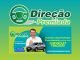 Imagem promocional da campanha "Direção Premiada". No topo, o logotipo com um volante estilizado. Abaixo, um homem sorridente ao lado de um Chevrolet Tracker. O texto destaca: "Só Ganha, Quem Participa! É sua chance de ganhar uma CHEVROLET TRACKER!". O site "http://www.direcaopremiada.com.br" é mencionado. O fundo tem cores em tons de verde e azul.