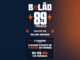 Banner promocional do Bolão 89 by Pinnacle com fundo em gradiente azul e laranja. O anúncio destaca prêmios de 3 viagens para o maior evento de futebol do mundo e R$99 MIL em prêmios.