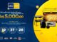 Banner promocional da marca de tintas Coral anunciando a campanha maiores e melhores. O anúncio destaca o sorteio final de R$5.000,00 e 50 prêmios instantâneos. No centro há um cronômetro regressivo e no lado direito ilustrações de eletrodomésticos cercados por moedas douradas flutuantes sobre um fundo azul e amarelo.