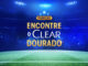 Imagem promocional da marca Clear em um estádio de futebol com iluminação azul. No centro, o texto destaca a frase Encontre o Clear Dourado. No canto superior direito, aparecem os logotipos da Clear e da Copa do Mundo FIFA 26.