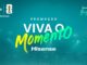 Anúncio da promoção Viva o Momento da Hisense para a Copa do Mundo FIFA 26. O fundo possui tons de turquesa e mostra o interior de um estádio de futebol com luzes brilhantes. O texto central é colorido em branco, amarelo e verde.