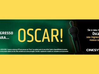 Banner promocional da rede Cinesystem com fundo verde escuro e o texto E o ingresso vai para... OSCAR! que anuncia a cortesia de um ingresso para pessoas que tenham Oscar no nome entre os dias 13 e 15 de março de 2026.