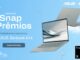 Banner publicitário da promoção Snap Prêmios, realizada pela ASUS e Snapdragon. A imagem mostra dois notebooks ASUS Zenbook A14 prateados flutuando em um céu azul com nuvens e sementes de dente-de-leão. O texto convida o internauta a se cadastrar para concorrer a dois aparelhos, apresentando um botão de chamada para ação e o logotipo Snapdragon X.