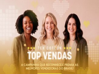 Três mulheres sorridentes de diferentes etnias posam juntas para a campanha Tex Cotton Top Vendas, em um fundo com corações pixelados.