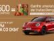 Banner publicitário com fundo em tom de bronze. Apresenta uma lata de trufas Dengo decorada com ilustrações de cacau e um carro elétrico GWM ORA 03 na cor vermelha. O texto anuncia que compras de R$500 dão direito ao brinde para clientes Club Ouro e Diamante, além da chance de concorrer ao veículo zero quilômetro.