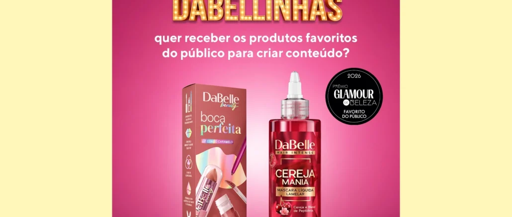 Kit Prêmio Glamour DaBelle Anúncio da marca DaBelle com fundo rosa. O título diz 'Atenção Dabellinhas' e pergunta se querem receber produtos para criar conteúdo. Abaixo, são exibidos dois produtos: o kit 'Boca Perfeita Lip Combo Caramelo' e a máscara capilar 'Cereja Mania'. Há um selo do Prêmio Glamour de Beleza 2026, categoria Favorito do Público.