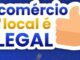 Imagem promocional com fundo azul e uma arte branca central com o texto comércio local é LEGAL. A peça inclui um marcador de localização amarelo e uma ilustração de mão fazendo o sinal de positivo.