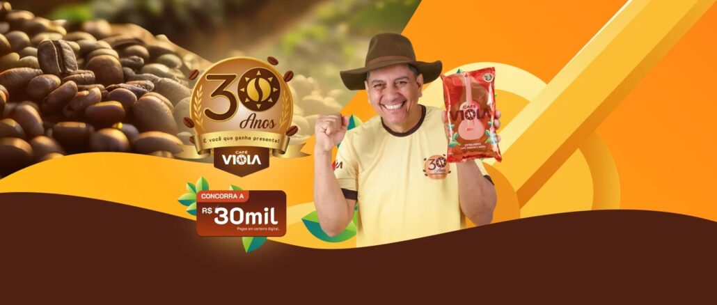 Banner comemorativo de 30 anos do Café Viola com um homem sorridente segurando um pacote de café e anúncio de prêmio de R$30.000,00.