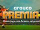 Imagem promocional da campanha Arauco Premia+ mostrando um jogador de futebol com uniforme laranja chutando uma bola em um estádio, acompanhado do texto Quem joga com Arauco, sai premiado.