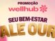 Imagem publicitária da promoção Wellhub com o título Seu bem-estar vale ouro escrito em letras douradas tridimensionais sobre fundo gradiente suave.