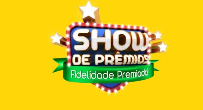 SHOW DE PRÊMIOS - FIDELIDADE PREMIADA Logotipo colorido da campanha Show de Prêmios Fidelidade Premiada com letras brancas em destaque sobre um fundo amarelo vibrante.
