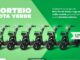 Anúncio publicitário do sorteio Rota Verde com seis bicicletas elétricas pretas alinhadas sobre um fundo verde vibrante com grafismos ondulados e textos explicativos sobre a promoção.