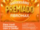 Banner promocional do Aniversário Premiado Fibromax com fundo laranja e balões dourados, destacando a oportunidade de ganhar um cheque de R$10.000,00.