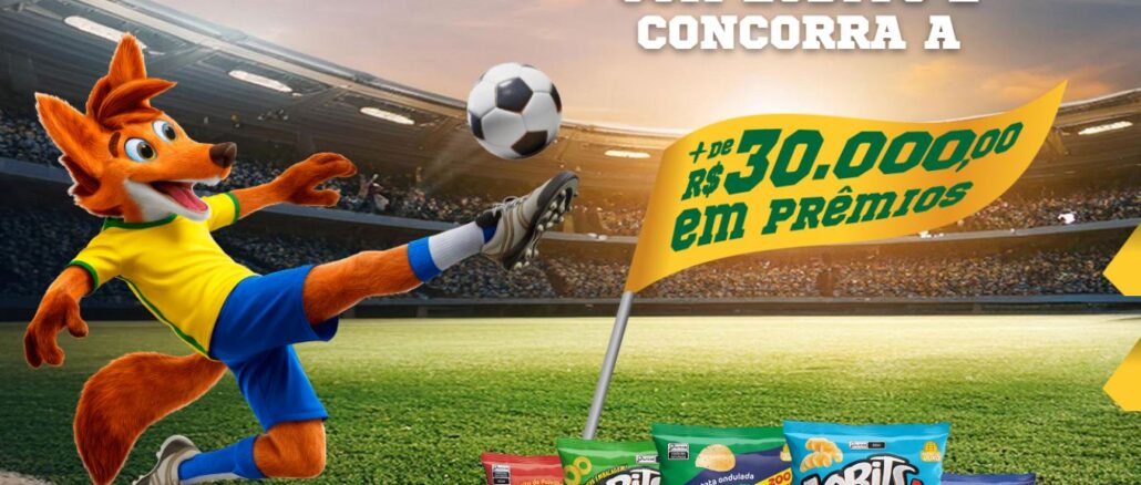 Mascote raposa com uniforme de futebol chuta uma bola em um estádio lotado ao pôr do sol. O anúncio destaca prêmios superiores a R$30.000,00 e exibe diversos pacotes de salgadinhos Lobits.