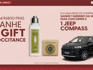 Banner publicitário com fundo rosa claro anunciando brinde da marca L'Occitane para compras de R$800 e sorteio de um veículo Jeep Compass a cada R$500 gastos.