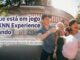 Quatro jovens adultos sorrindo e se divertindo ao ar livre, em frente a um parque temático, com um deles segurando um algodão-doce rosa. Texto da imagem: "O que está em jogo na KNN Experience Orlando — São 3 intercâmbios completos com tudo pago, 01 curso na KNN Orlando por dia e mais de 500 prêmios exclusivos!"