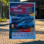 Banner promocional da Rede da Gente Gaúcha Supermercados exibindo sorteio de caminhonete RAM Rampage, carro elétrico BYD e televisores, com prêmio total de R$420.000,00.