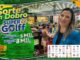 Banner publicitário da promoção Sorte em Dobro do Supermercado Super Golff, com prêmios em vale-compras de R$5.000,00 e R$8.000,00, apresentada por uma mulher dentro de uma unidade da rede.