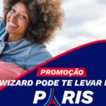 Arte promocional da Wizard com dois jovens sorridentes ao ar livre e o texto "Wizard Pode Te Levar Para Paris".