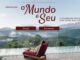 Banner da Promoção O Mundo é Seu da American Express, com prêmio de 5 milhões de pontos, exibindo mulher relaxando em espreguiçadeira à beira de piscina com vista para montanhas e floresta tropical.
