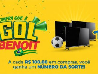 Banner da promoção Compra que é Gol das Lojas Benoit com fundo amarelo, televisores e bolas de futebol. O texto informa que a cada R$100,00 em compras o cliente ganha um número da sorte para concorrer a uma TV por dia.