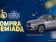 Banner promocional da campanha Compra Premiada Havan 40 Anos com fundo azul, confetes dourados, um SUV prata e o empresário Luciano Hang acenando.