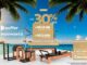 Banner da promoção Kauffer Pilates com equipamentos de pilates expostos em cenário de praia tropical e destaque para vale-viagem a Cancún, desconto acima de 30%, R$12 mil em bonificações e R$2.000 em brindes.