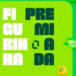 Banner promocional da iCred com os dizeres "Figurinha Premiada" em letras grandes, acompanhado de elementos gráficos de moedas, cédulas e troféu da Copa do Mundo, em fundo verde vibrante.