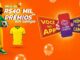 Personagem animada com roupa esportiva nas cores verde e amarelo segura uma bola de futebol ao lado de uma camiseta amarela, com destaque para a promoção Você no App Prêmios em Campo do Clube Camilo, oferecendo mais de R$40.000,00 em prêmios.