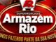 Arte comemorativa dos 8 anos do Supermercado Armazém Rio, com fundo vermelho, moldura oval dourada, logotipo em formato de carrinho de compras e balões decorativos ao redor.