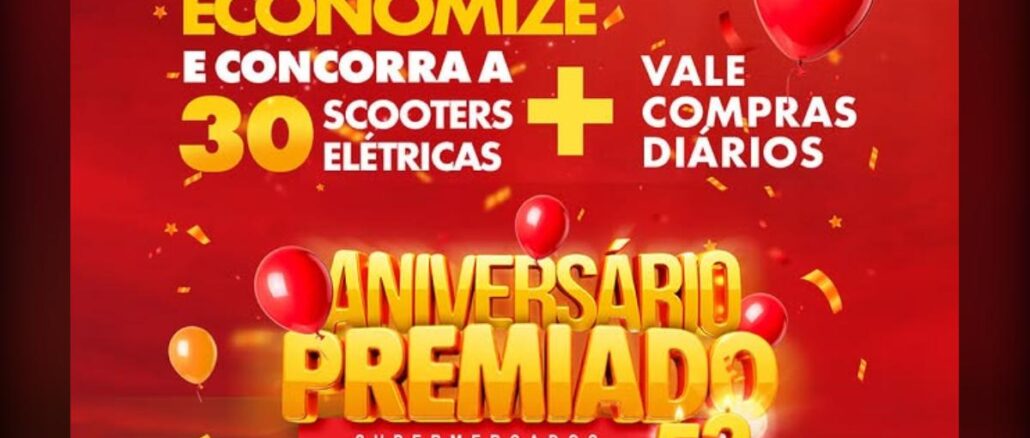 Banner vermelho da promoção Aniversário Premiado dos Supermercados Imperatriz em Santa Catarina, com balões vermelhos e laranja, confetes dourados e os dizeres compre, economize e concorra a 30 scooters elétricas mais vale compras diários, celebrando 52 anos.