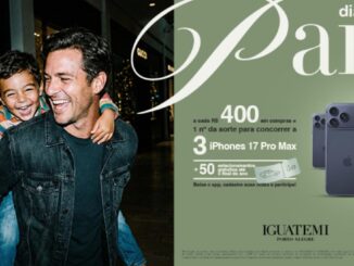 Pai carrega o filho nas costas sorrindo em shopping decorado para o Dia dos Pais, com destaque para promoção de três iPhones 17 Pro Max no Iguatemi Porto Alegre