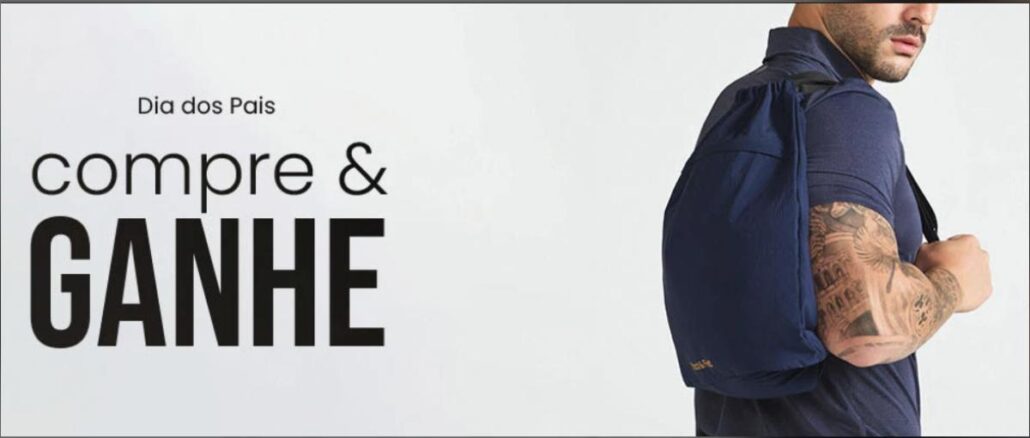 Banner promocional Dia dos Pais Track&Field 2026 com a frase compre e ganhe em destaque e homem carregando mochila azul marinho da marca