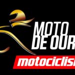 Logotipo do prêmio Moto de Ouro 2026 da revista Motociclismo, com ícone dourado de motociclista em movimento e fundo preto.