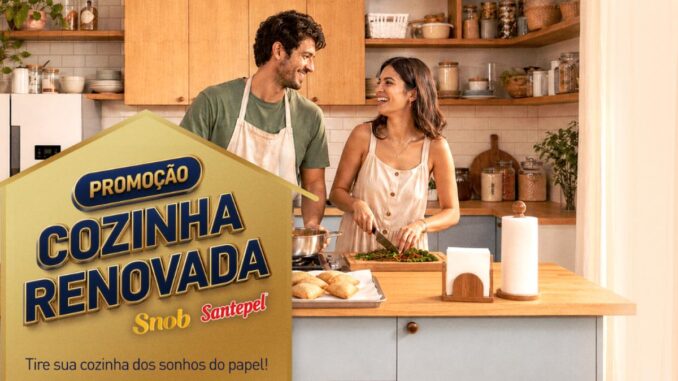 Banner da Promoção Cozinha Renovada Snob e Santepel, com casal cozinhando em uma cozinha moderna e bem decorada.