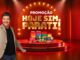 Banner da Promoção Hoje Sim, Parati, com apresentador sorridente apontando para produtos da marca expostos em um palco iluminado.