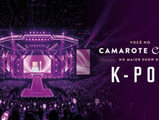 Banner da promoção "Você no Camarote Etleé no Maior Show de K-Pop", com palco iluminado em tons roxos e multidão ao fundo.