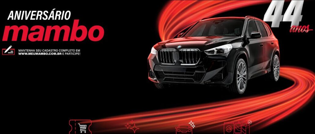 Aniversário 44 Anos Mambo em São Paulo Banner da promoção Aniversário Mambo 44 anos com um BMW X1 preto sobre fundo escuro e rastros de luz vermelha, informando que a cada R$150,00 em compras o cliente recebe 1 número da sorte para concorrer ao carro.