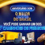 Banner da promoção Aniversário DOM: O Maior Corre do Brasil, com 7 caminhões de prêmios para concorrer no Dom Atacadista.