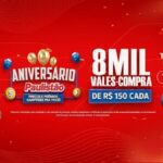 Banner vermelho da promoção Aniversário Paulistão com dois homens sorridentes à esquerda, balões dourados e azuis, e o destaque de 8 mil vales-compra de R$150 cada.