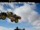 Caminhonete off-road com adesivos Monster Energy e Toyo Tires saltando no ar sobre um carro esportivo, com céu azul ao fundo e texto "Promoção Compre e Ganhe Monster Energy" no topo da imagem.